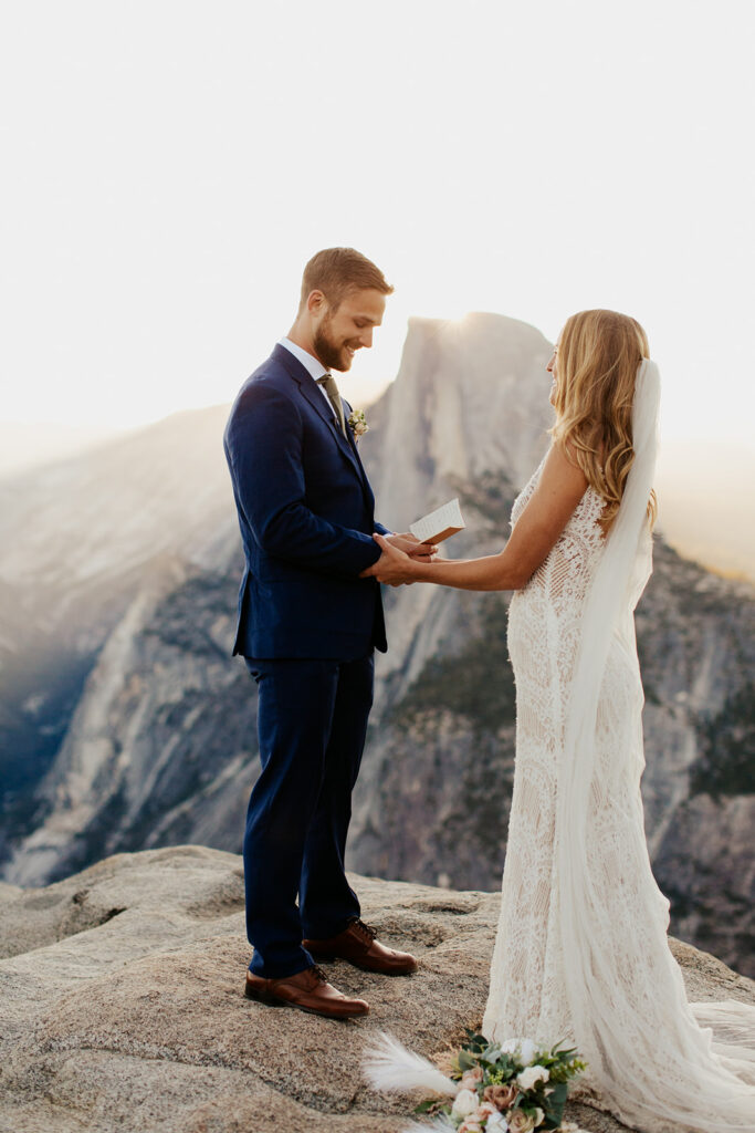 couple exchanges vows at Glacier Point elopement