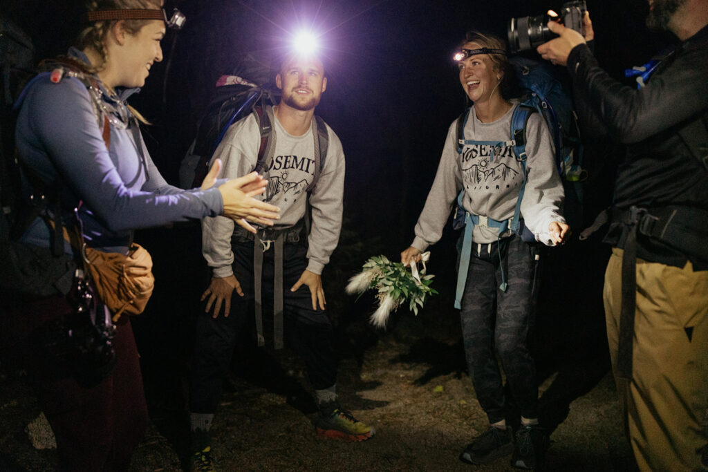 couple hikes with headlamps at Yosemite backpacking elopement